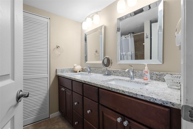 bathroom with vanity, tile patterned flooring, and a shower with shower curtain