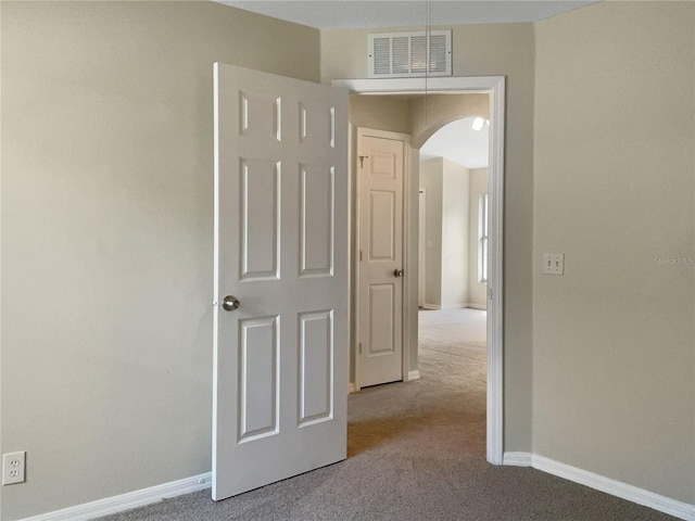 corridor featuring carpet floors