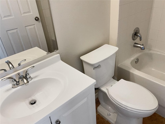 full bathroom with tiled shower / bath combo, vanity, and toilet