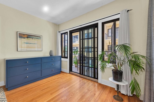 doorway to outside with light hardwood / wood-style flooring