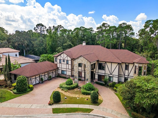 tudor home with a garage