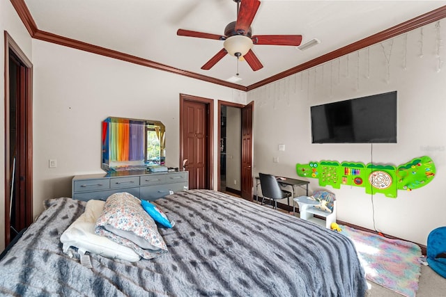 bedroom with carpet flooring, ornamental molding, and ceiling fan