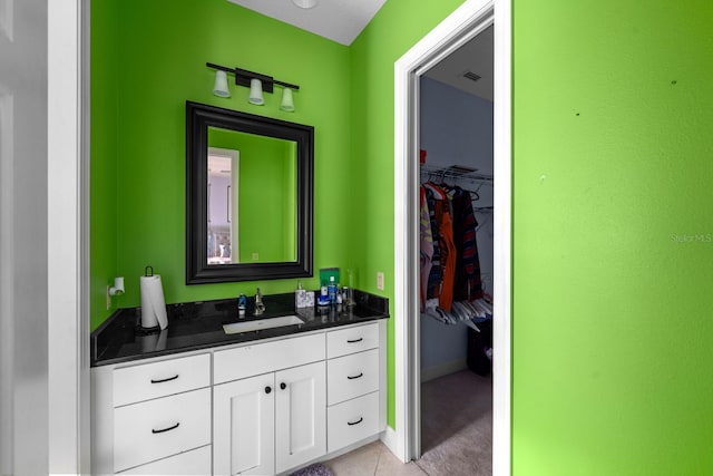 bathroom with vanity and tile patterned floors