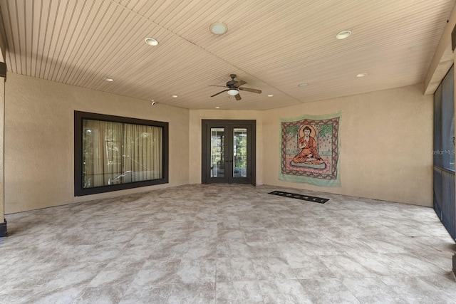 interior space featuring ceiling fan