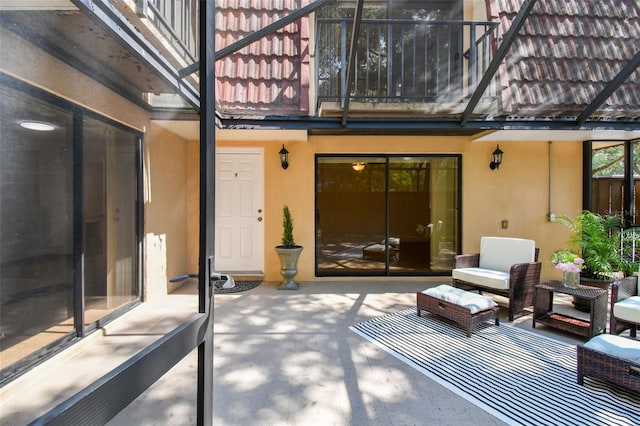 view of patio / terrace with a balcony