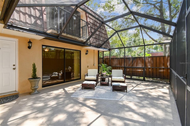 view of patio / terrace with a lanai