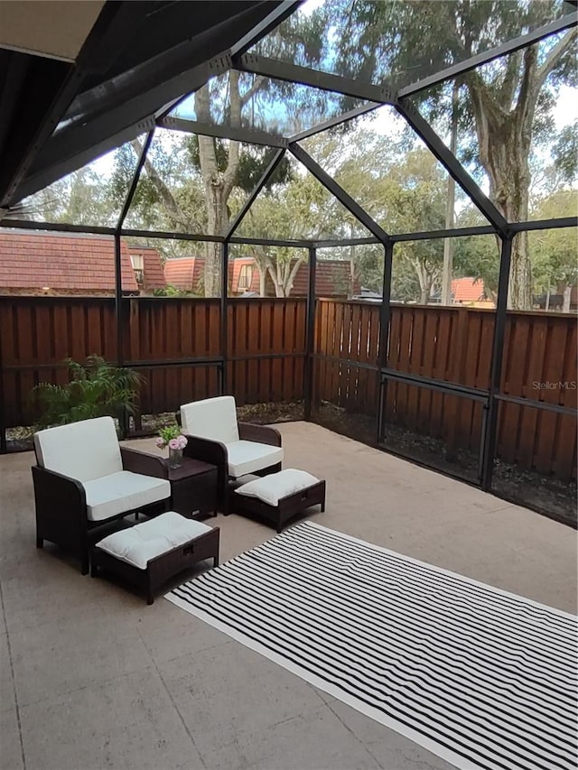 view of patio / terrace with a lanai