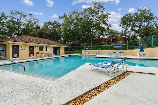 view of swimming pool featuring a patio