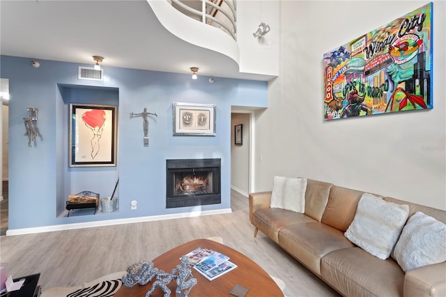 living room with light hardwood / wood-style floors