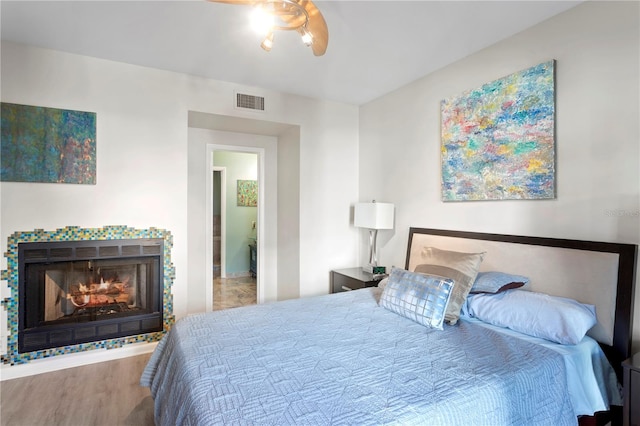 bedroom with wood-type flooring