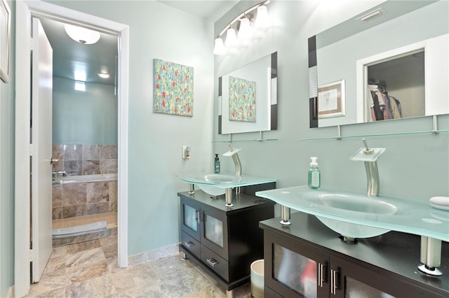 bathroom featuring a bathtub and vanity