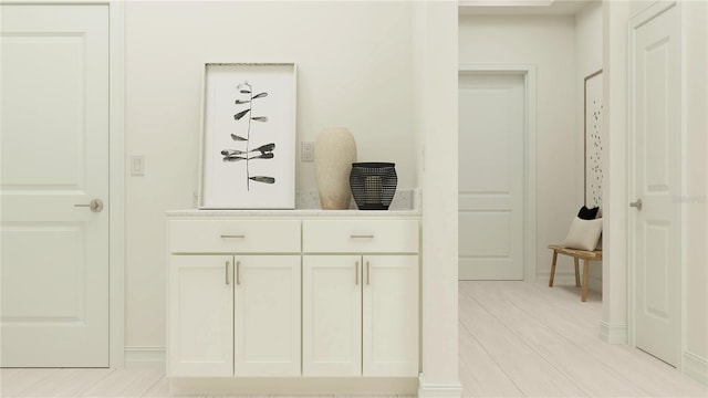 hallway featuring light hardwood / wood-style floors