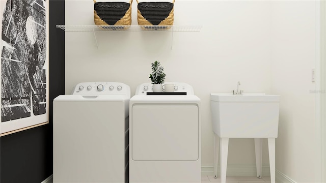 laundry room featuring independent washer and dryer