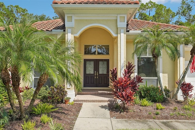 view of exterior entry with french doors