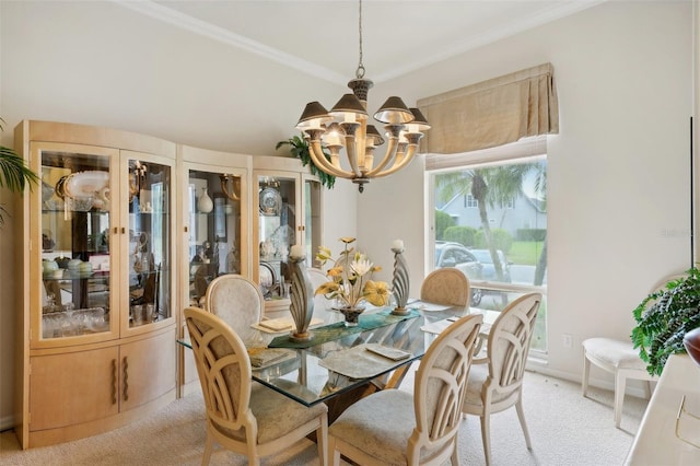 carpeted dining space featuring a chandelier