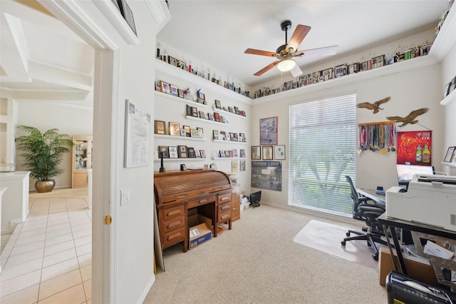 tiled office space with ceiling fan