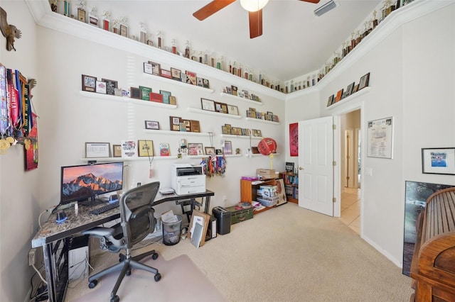 office space with light colored carpet and ceiling fan