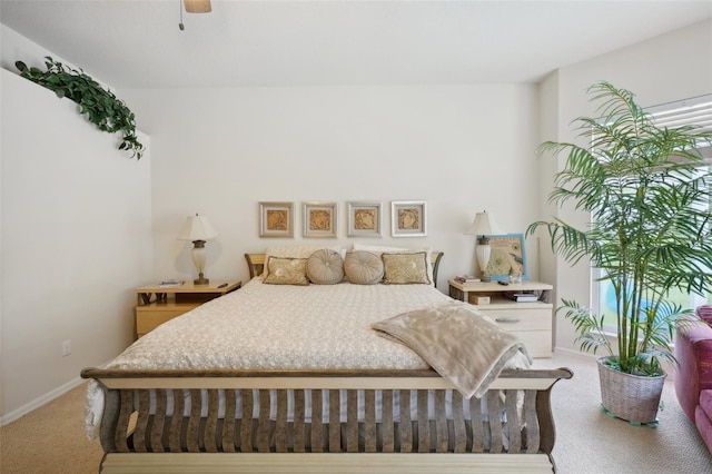 bedroom with carpet flooring and ceiling fan