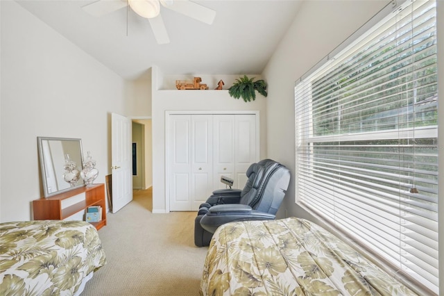 carpeted bedroom with a closet and ceiling fan