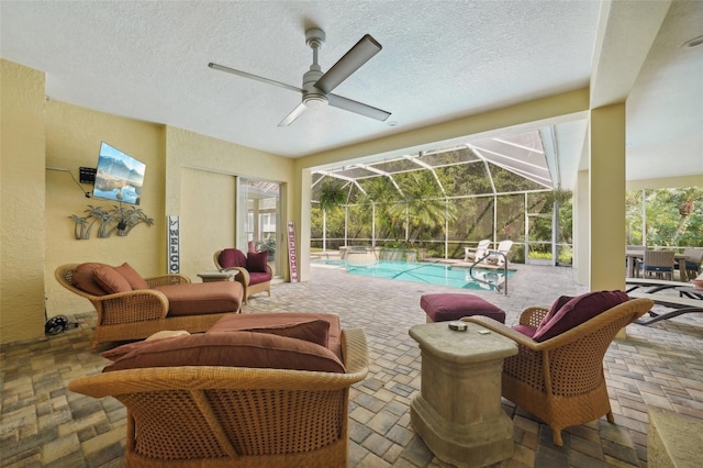 exterior space with ceiling fan and a lanai