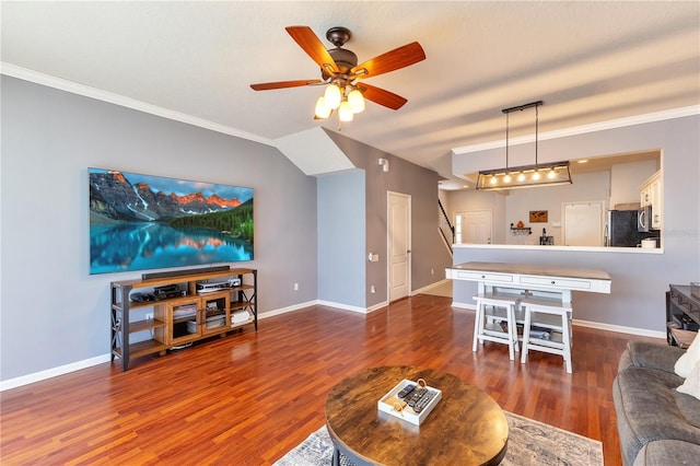 living room with ceiling fan, dark hardwood / wood-style floors, and crown molding