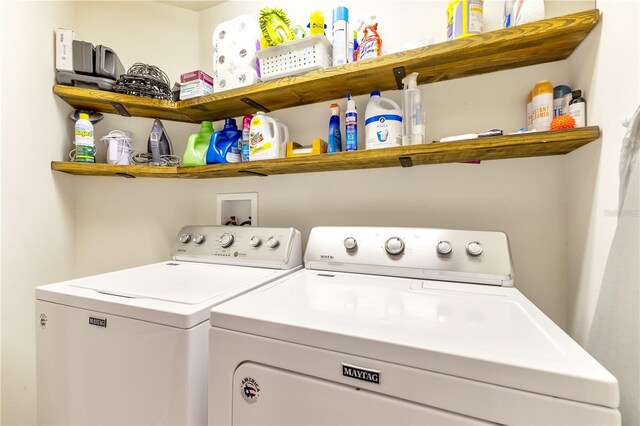 washroom with washer and clothes dryer