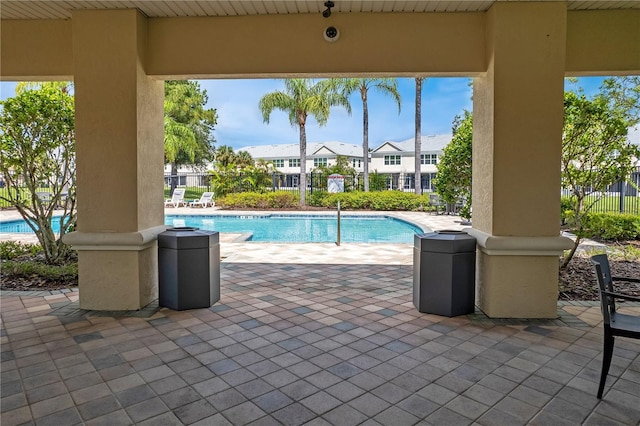 view of swimming pool with a patio