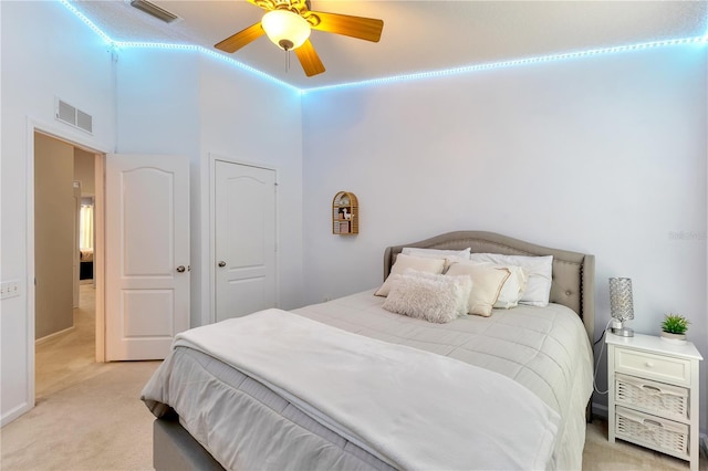 carpeted bedroom featuring ceiling fan