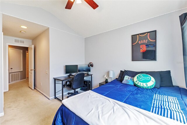 carpeted bedroom featuring ceiling fan and lofted ceiling