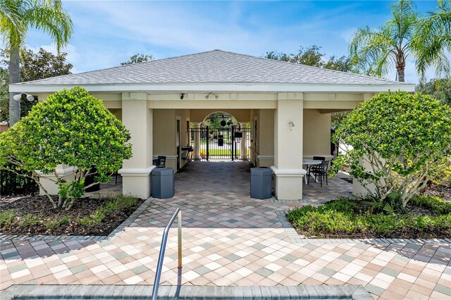 surrounding community with a patio area