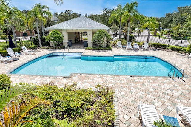 view of pool featuring a patio area