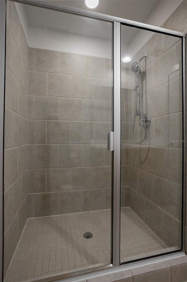 bathroom with an enclosed shower