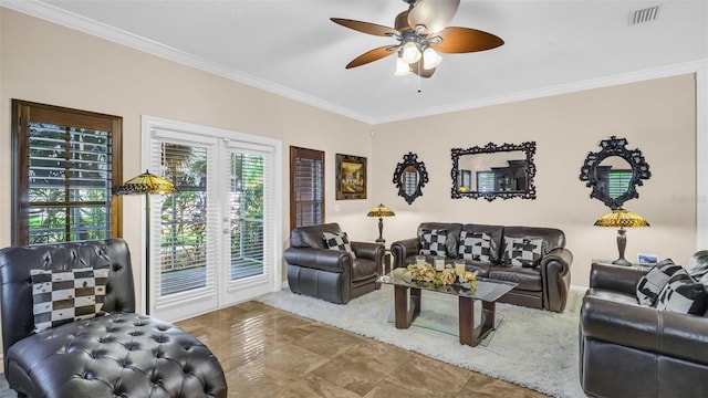 living room with ornamental molding and ceiling fan