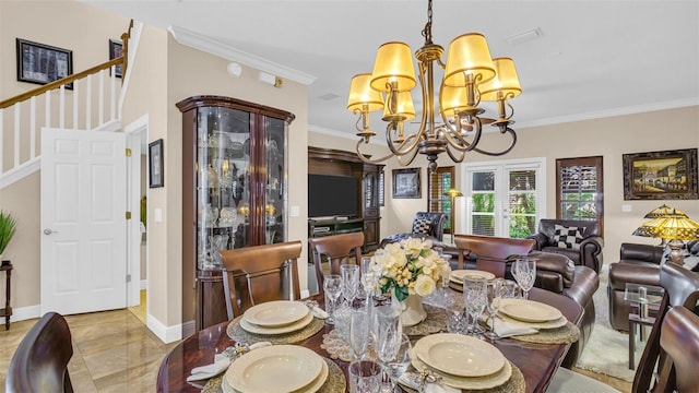 dining area featuring a notable chandelier and ornamental molding