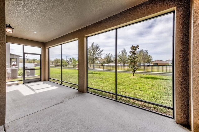 unfurnished sunroom with a healthy amount of sunlight