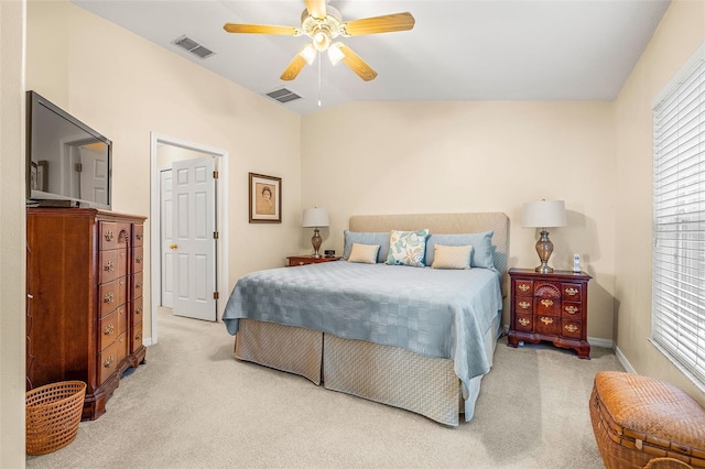 carpeted bedroom featuring ceiling fan and lofted ceiling