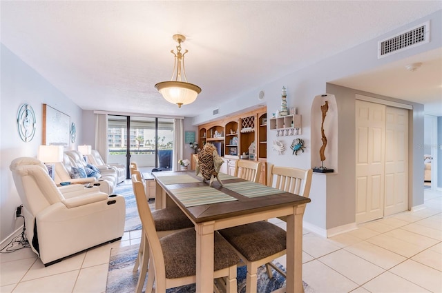 view of tiled dining space