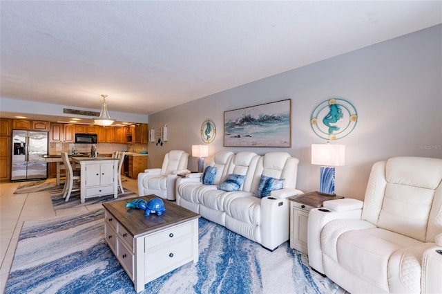 living room featuring light tile patterned floors