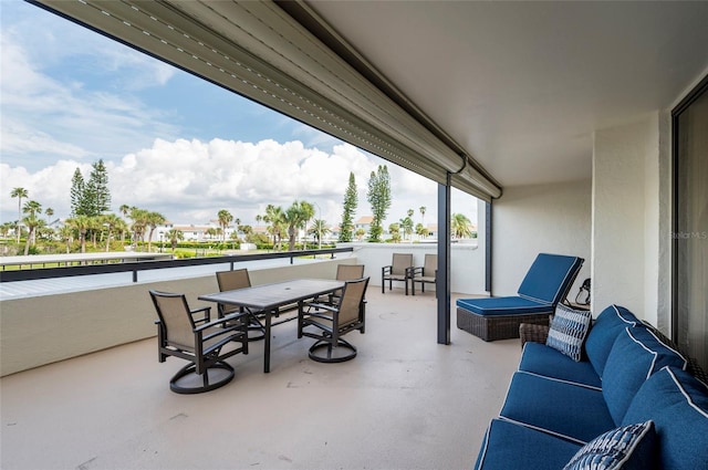 view of patio / terrace with a balcony