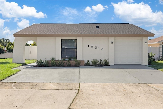 ranch-style home with a garage