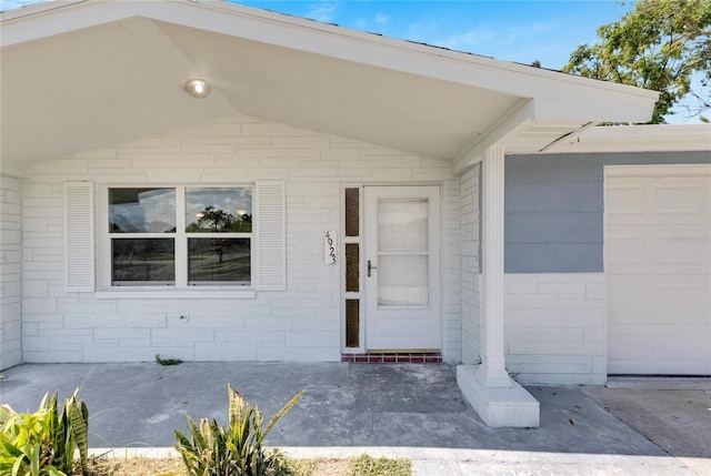 entrance to property with a garage