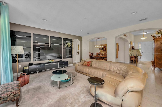 living room with tile patterned flooring