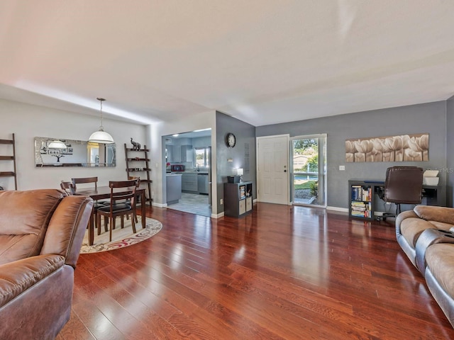 living room with dark wood-type flooring