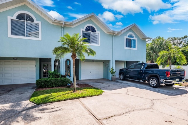 view of front of property with a garage