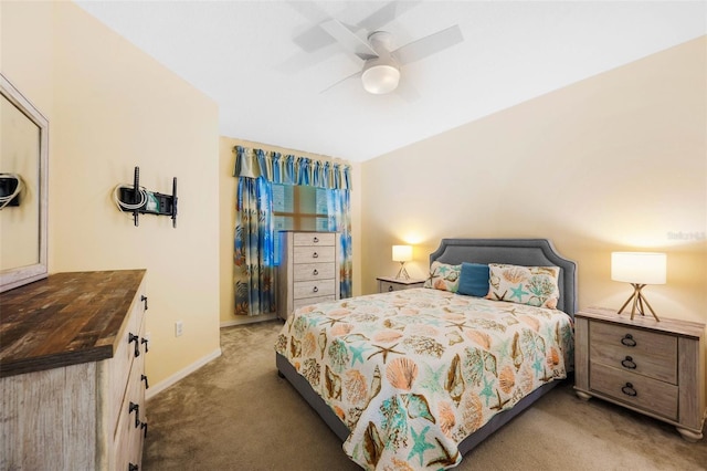 bedroom with ceiling fan and light carpet