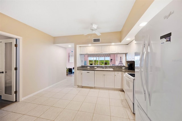 kitchen featuring white cabinets, ceiling fan, light tile patterned floors, sink, and white appliances