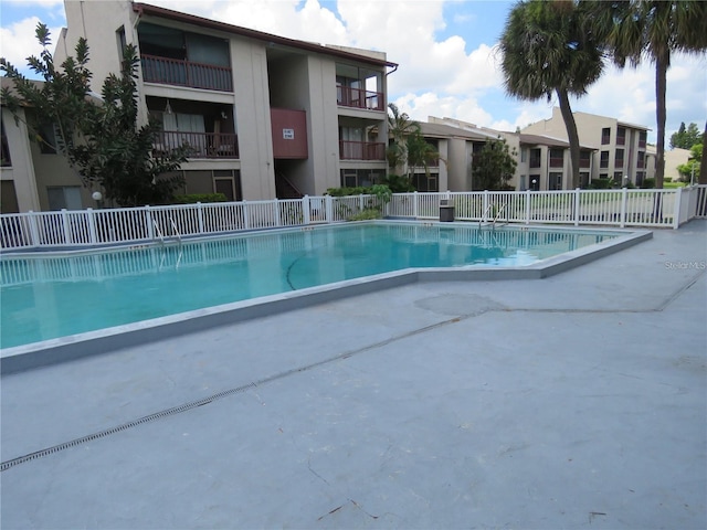3845 S Lake Dr Unit 192, Tampa, FL 33614 - community pool featuring a patio