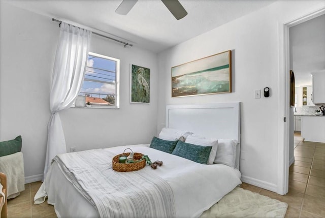 bedroom featuring ceiling fan and light tile patterned flooring