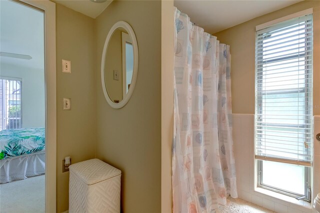 bathroom featuring walk in shower