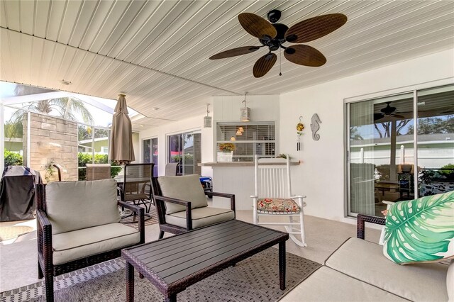 view of patio featuring ceiling fan and an outdoor hangout area